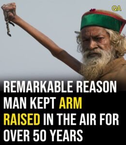 HT4. Remarkable reason man kept arm raised in the air for over 50 years
